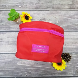 กระเป๋า Clarins sustainable pouch made of reycled materials ทรงกลม สีแดง ใส่เครื่องสำอาง