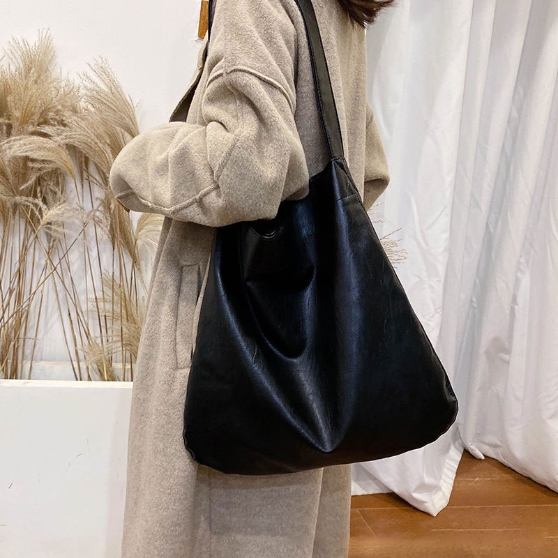 YADOU ใหม่กระเป๋าสะพายแฟชั่นและอเนกประสงค์สีทึบวัสดุ PU สไตล์เกาหลีกระเป๋าถือย้อนยุคความจุขนาดใหญ่ที่จำเป็นสำหรับการเดินทาง