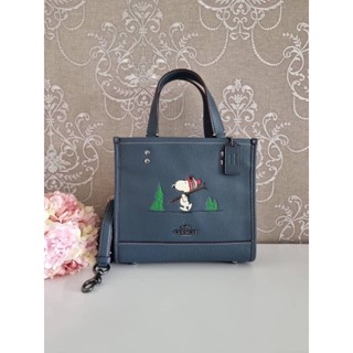 (ผ่อน0%) กระเป๋าสะพายข้าง Coach X Peanuts Dempsey Tote 22 With Snoopy Ski Motif CE849 หนังแท้สี denim ลายสนู้ปปี้