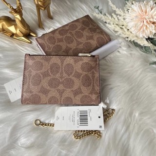 พร้อมส่ง แท้ 💯% Coach Shop Zip Chain Card Case In Signature Canvas C0847