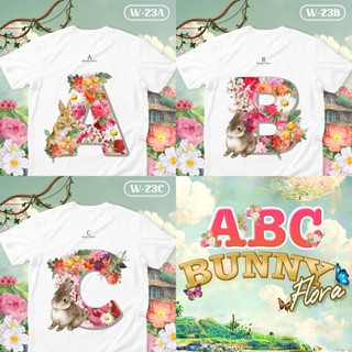 [S-5XL]ผ้าฝ้าย 100% เสื้อยืดตัวอักษร Bunny Flora ตัวอักษร( A B C )