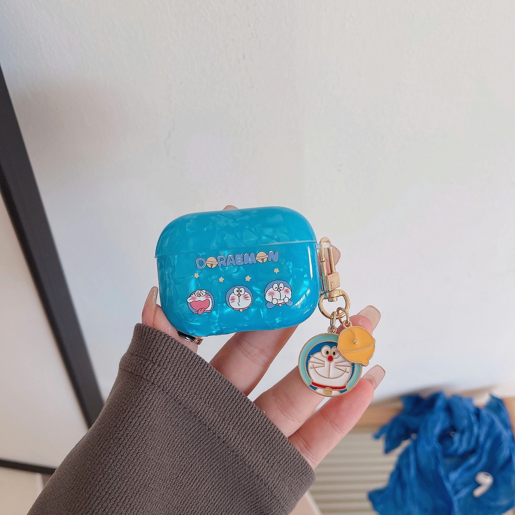 เคสหูฟังบลูทูธไร้สาย ซิลิโคน Tpu นิ่ม แบบใส กันกระแทก ลายโดราเอมอน หินอ่อน แวววาว เรียบง่าย สําหรับ AirPods 1 2 3 Pro 2 2022 - รูปที่ 4