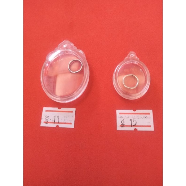 กรอบพระวงรีใสไม่มีหู