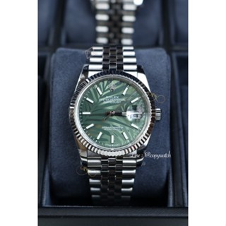 Rolex Datejust  Steel 36 mm. Green palm Automatic swiss movement Unisex