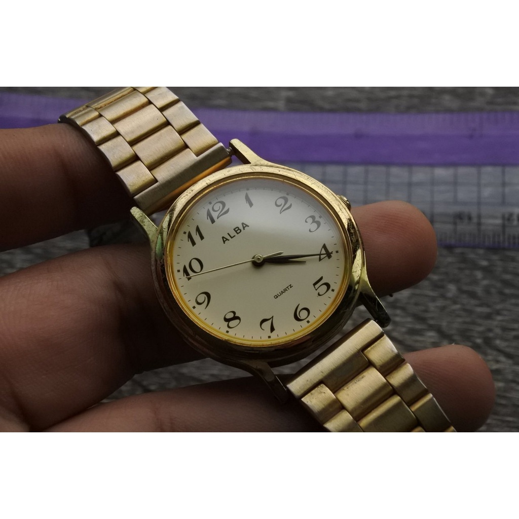 นาฬิกา Vintage มือสองญี่ปุ่น SEIKO ALBA Y121 K005 ระบบ QUARTZ ผู้ชาย ทรงกลม กรอบทอง หน้าทอง หน้าปัด 34mm