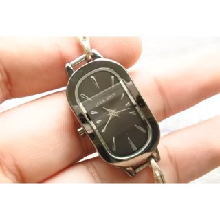 นาฬิกา Vintage มือสองญี่ปุ่น NINE WEST ระบบ QUARTZ ผู้หญิง รูปไข่ กรอบเงิน หน้าดำ หน้าปัด 23mm