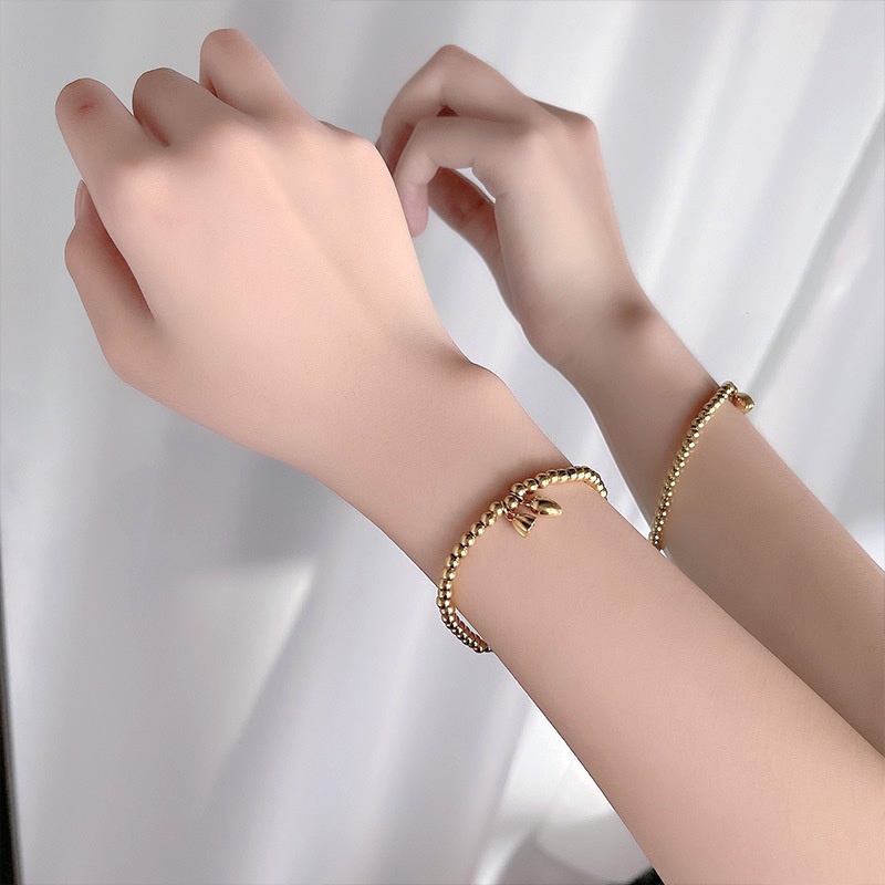 เครื่องประดับ สร้อยข้อมือ สายเหล็กไทเทเนียม จี้ดอกบัว ขนาดเล็ก เหมาะกับของขวัญ แบบเรียบง่าย สไตล์ชนเผ่า สําหรับผู้หญิง