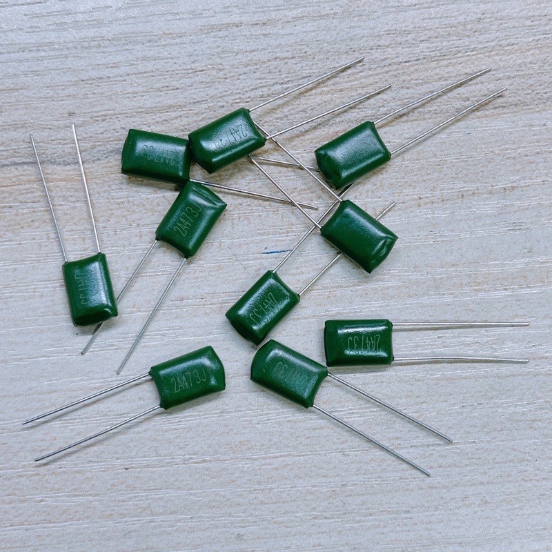 C. ไมล่า 473 2A473J (0.047) สีเขียว 100V.