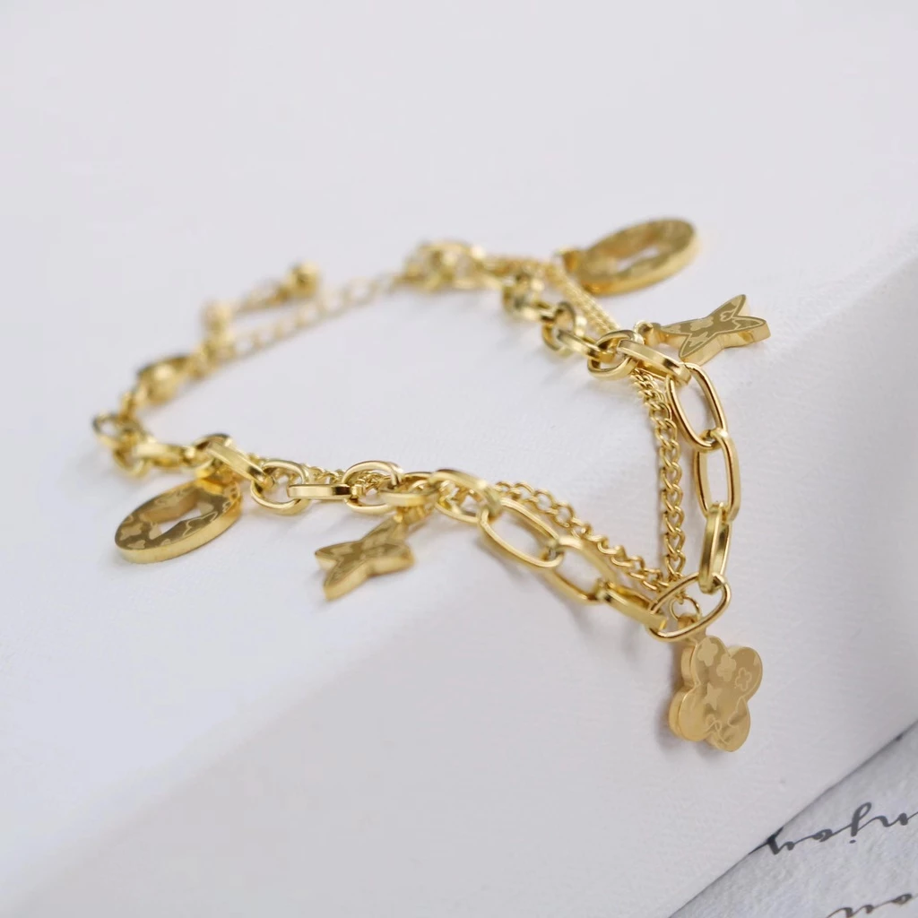 สร้อยข้อมือไทเทเนียม จี้ดอกไม้ thumbnail 6
