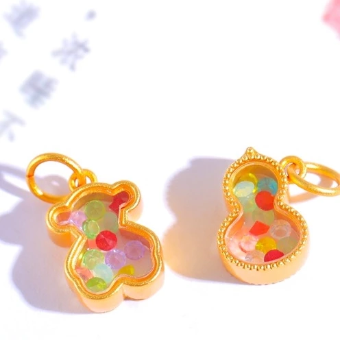 สร้อยข้อมือจี้น้ำเต้าประดับเพชร สีทอง thumbnail 10