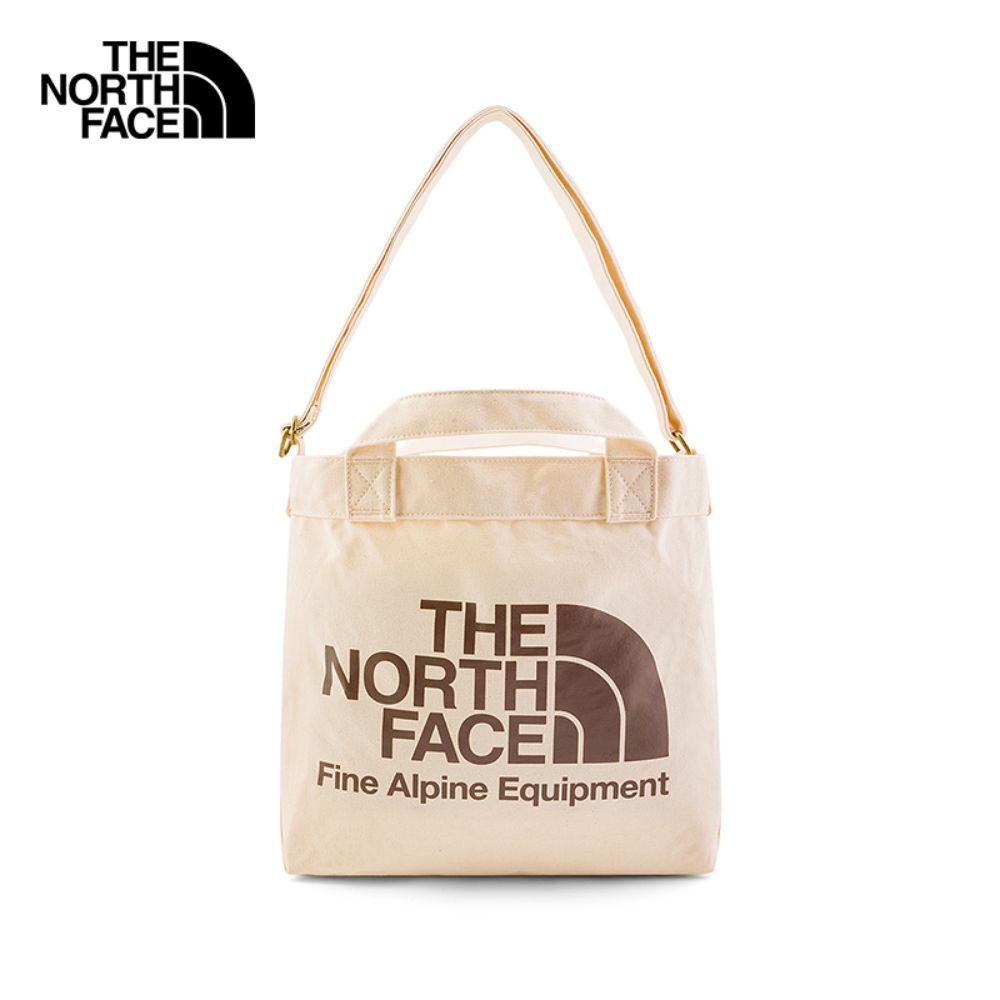 THE NORTH FACE ADJUSTABLE COTTON TOTE - WEIMARANER BRN LARGE LOGOPRINT กระเป๋าสะพายข้าง UNISEX