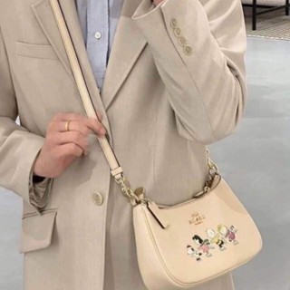 ส่งฟรี​ ผ่อน​0% New Coach X Peanuts Teri Shoulder Bag