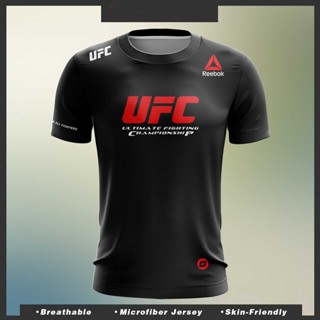 เสื้อกีฬาแขนสั้น ผ้าไมโครไฟเบอร์ ลายโลโก้ UFC X Reebok RED