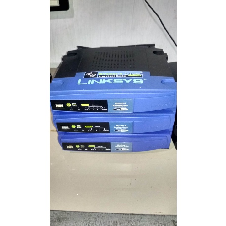 Linksys WRT 54GL + อแดปเตอร์