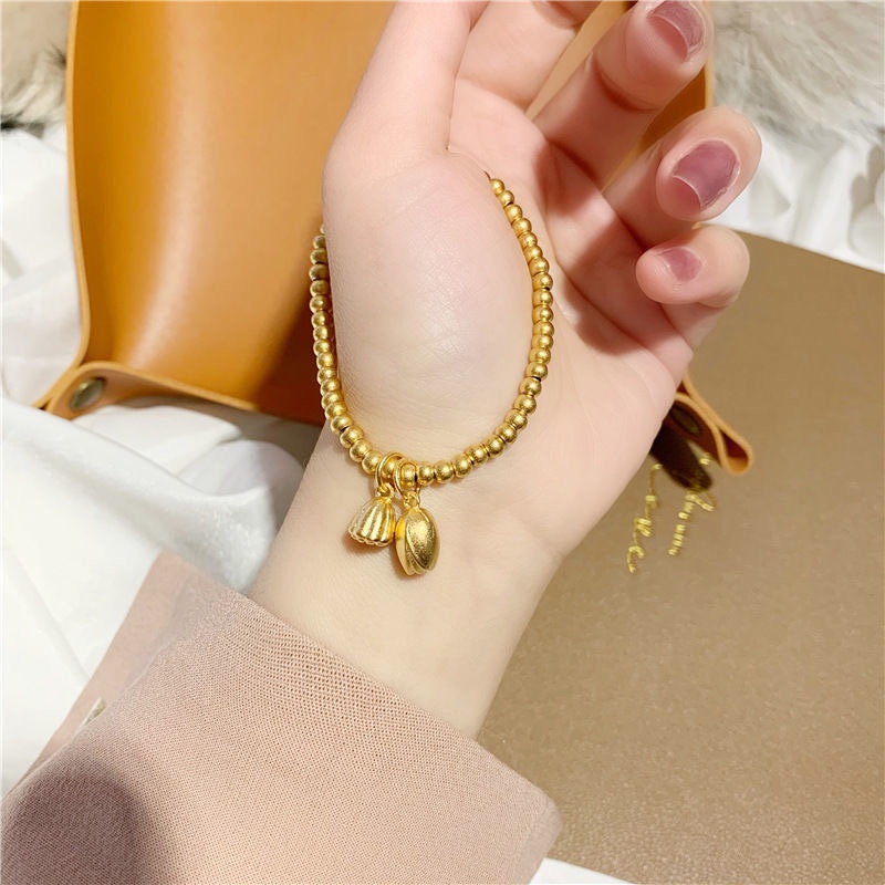 เครื่องประดับ สร้อยข้อมือ สายเหล็กไทเทเนียม จี้ดอกบัว ขนาดเล็ก เหมาะกับของขวัญ แบบเรียบง่าย สไตล์ชนเผ่า สําหรับผู้หญิง