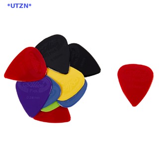 Utzn&gt; ปิ๊กกีตาร์อลิซ ไนล่อน กันลื่น สีดํา สีขาว อุปกรณ์เสริม สําหรับกีตาร์อะคูสติก กีตาร์ไฟฟ้า อูคูเลเล่ 10 ชิ้น