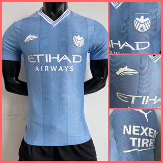 เสื้อกีฬาแขนสั้น ลายทีมชาติฟุตบอล Manchester City 23-24 24-48 ชั่วโมง คุณภาพสูง