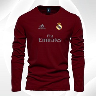 เสื้อยืดแขนยาว ผ้าฝ้าย พิมพ์ลายโลโก้ Real Madrid Fly สีเงิน สําหรับผู้ชาย และผู้หญิง