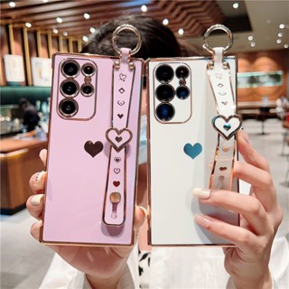 เคสโทรศัพท์มือถือ ลายหัวใจ พร้อมสายคล้องมือ หรูหรา สําหรับ Samsung Galaxy S23 UItra S22 Plus S21 UItra S22 S21 FE