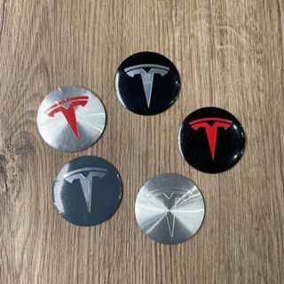 สติกเกอร์ติดขอบดุมล้อรถยนต์ อะลูมิเนียม ขนาด 56 มม. 5.6 ซม. สําหรับ TESLA hub cap paste logo hubcap 4 ชิ้น ต่อชุด