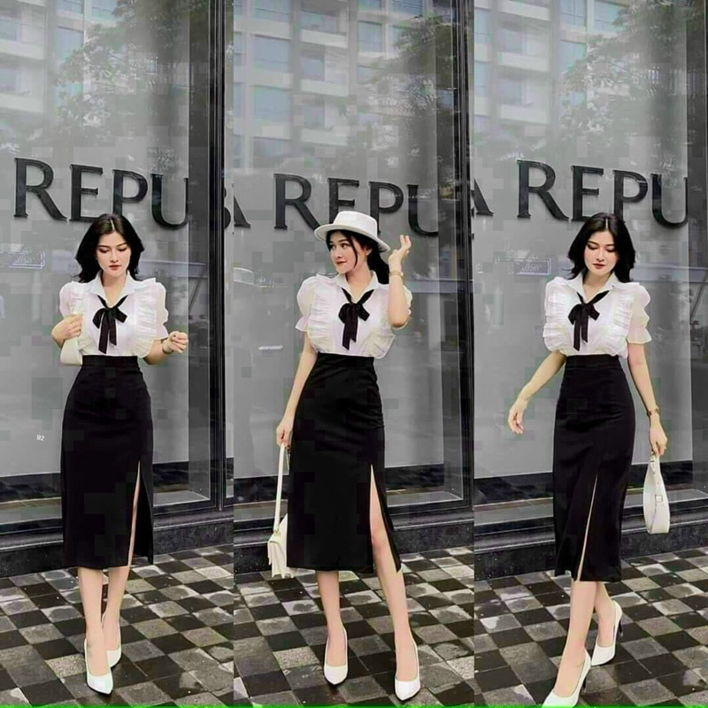 ชุดกระโปรงผู้หญิงแฟชั่นออฟฟิศเสื้อผ้าไหมระบายมีโบว์ดําผสมกระโปรงยาวผ่าต้นขา umi