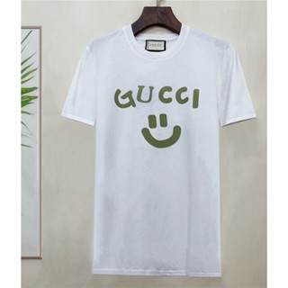 Gucc1 ใหม่ เสื้อยืดลําลอง ผ้าฝ้าย แขนสั้น คอกลม พิมพ์ลายหน้ายิ้ม สําหรับผู้ชาย S-4XL