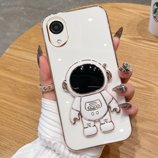 Modu เคสโทรศัพท์มือถือชุบไฟฟ้า ลายนักบินอวกาศ หรูหรา พร้อมขาตั้ง สีมาการอง สําหรับ Samsung Galaxy A03 Core