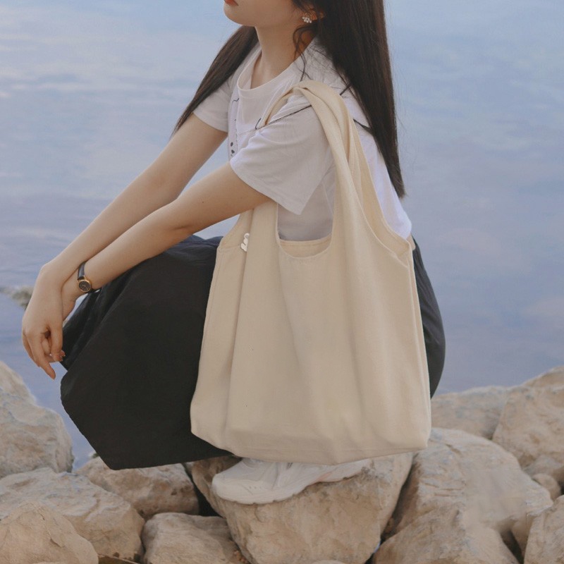 กระเป๋าสะพายไหล่ ผ้าแคนวาส ขนาดใหญ่ จุของได้เยอะ สีเบจ แบบเรียบง่าย เหมาะกับของขวัญ สําหรับผู้หญิง