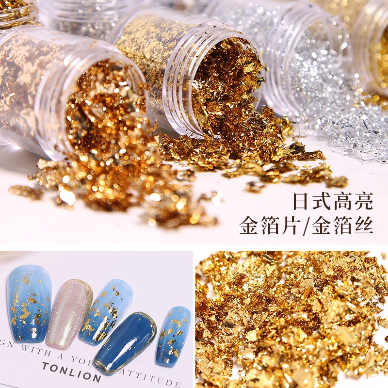 กระดาษฟอยล์สีทอง/เงิน กระดาษผ้าไหม ฟอยล์ดีบุก ส่องไฟ ยาทาเล็บ กาว DIY แพทช์ เครื่องประดับ อุปกรณ์ทําเล็บ WZS47