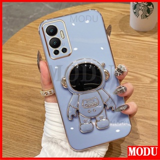 Modu เคสโทรศัพท์มือถือ ซิลิโคนนิ่ม ลายนักบินอวกาศ 6D พร้อมขาตั้ง สําหรับ Infinix Hot 12 X6817B