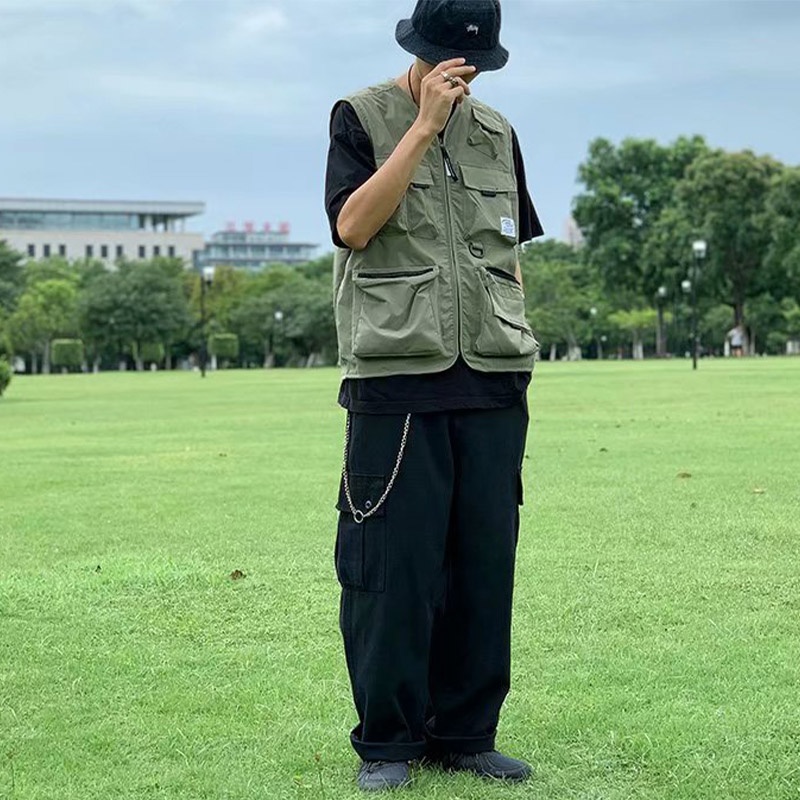 Suikone เสื้อกั๊กผู้ชายแฟชั่นสไตล์เกาหลีสไตล์คู่รักหลายกระเป๋าชุดทำงานด้านบนแขนกุดลำลองหลวมน้ำแบรนด์โค้ท - รูปที่ 4