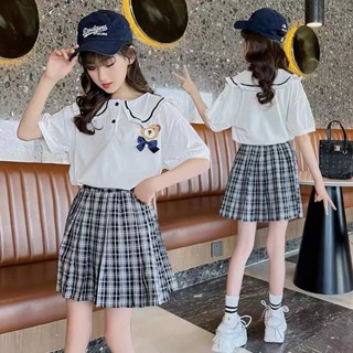 [พร้อมส่ง] เสื้อผ้าเด็ก 3-14 ปี สาวใหญ่ แขนสั้น ชุดฤดูร้อน ใหม่ สไตล์ต่างประเทศ เด็ก สุทธิ ชุดสีแดง สาวอินเทรนด์ กระโปรงลายสก๊อต เสื้อยืด ชุด 2 ชิ้น