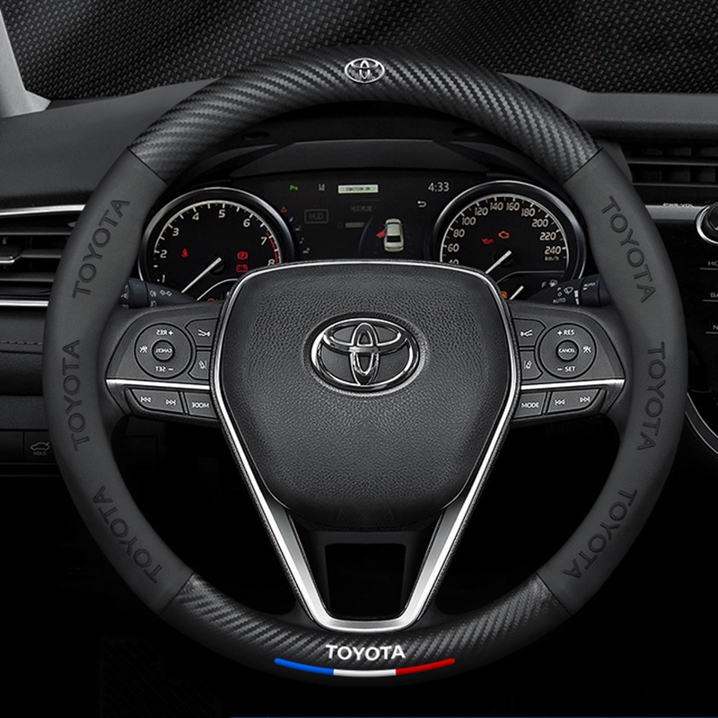 ปลอกหนังหุ้มพวงมาลัยรถยนต์ คาร์บอนไฟเบอร์ ขนาด 38 ซม. สําหรับ Toyota Avanza Vios Wigo RushHilux Corolla Cross Hiace RAV4 FJ Cruiser Yaris Camry Alphard Corolla Altis Sienna