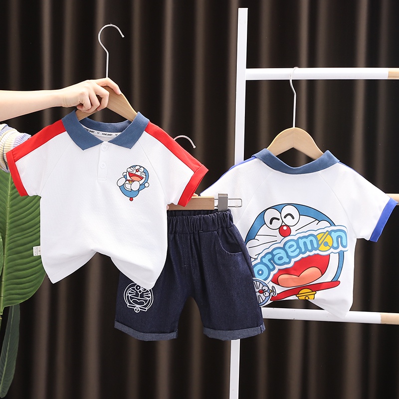 เสื้อโปโลแขนสั้นลําลอง ผ้าฝ้าย พิมพ์ลายการ์ตูนโดราเอมอน และกางเกงขาสั้น แฟชั่นฤดูร้อน สําหรับเด็ก [ไซซ์ 80-120 ซม.]