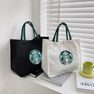 พร้อมส่ง Starbucks กระเป๋าถือ กระเป๋าช้อปปิ้ง ผ้าแคนวาส ขนาดเล็ก จุของได้เยอะ แฟชั่นเรียบง่าย สําหรับใส่กล่องอาหารกลางวัน พนักงานออฟฟิศ 2023