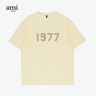 Ami เสื้อยืด แขนสั้น ทรงหลวม สไตล์อเมริกัน 1977 สําหรับทุกเพศ ทุกวัย