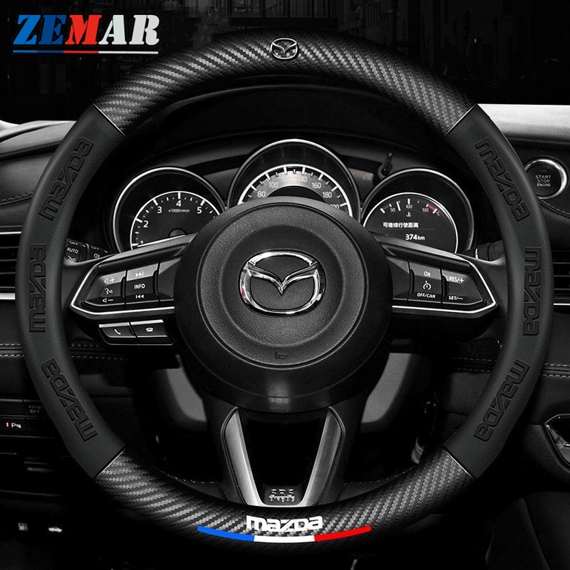 ปลอกหุ้มพวงมาลัยรถยนต์ ลายโลโก้คาร์บอน 3D สําหรับ Mazda 38 ซม. 2 3 CX5 CX30 CX8 CX3 Mazda2 6 5 bl gh gp