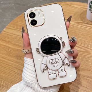 Modu เคสโทรศัพท์มือถือชุบไฟฟ้า ลายนักบินอวกาศ หรูหรา พร้อมขาตั้ง สีมาการอง สําหรับ Xiaomi Redmi A1 4G 2022