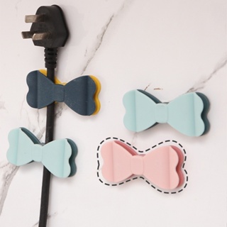 Bowtie อุปกรณ์คลิปซิลิโคน มีกาวในตัว สําหรับจัดเก็บสายเคเบิ้ล USB