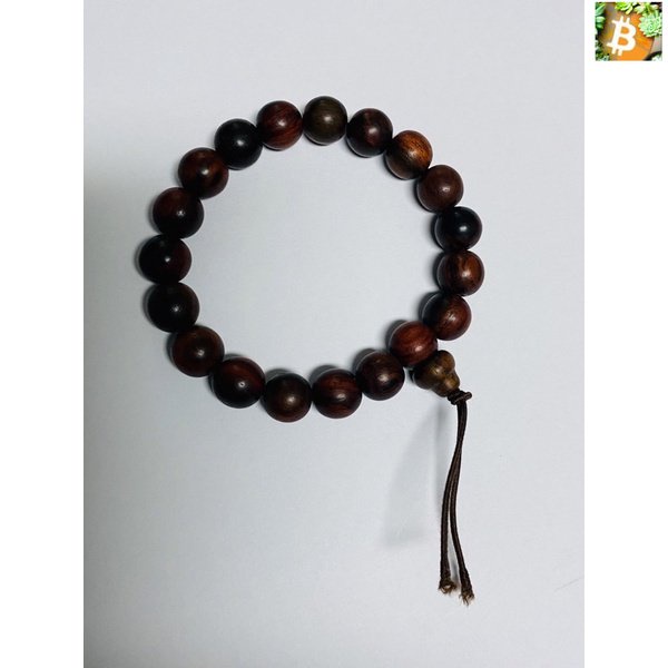 Bitcoin สร้อยข้อมือ ลูกประคำ ทำจากไม้พยุง จำนวน ประมาณ 20เม็ด ขนาดเม็ดประมาณ 9-10 มม.