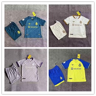 เสื้อกีฬาแขนสั้น ลายทีมชาติฟุตบอล AL NASSR 22/23 ชุดเยือน สําหรับเด็ก (ด้านบน และกางเกง)