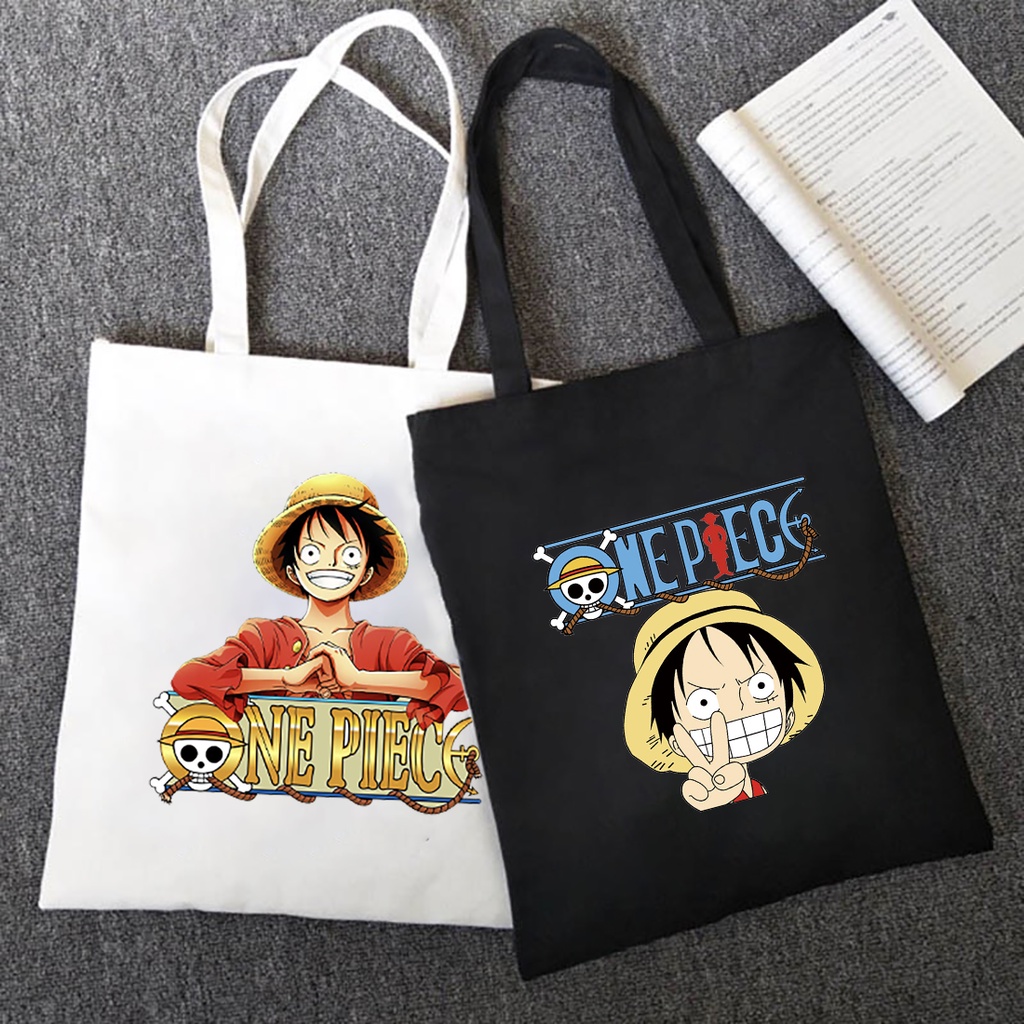 กระเป๋าสะพายไหล่ ผ้าแคนวาส ลายการ์ตูนอนิเมะญี่ปุ่น One Piece นํากลับมาใช้ใหม่ได้ (พร้อมกระเป๋าด้านใน และปุ่มกด)