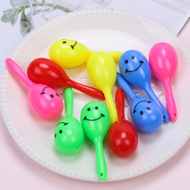 การ์ตูนยิ้มใบหน้าที่มีสีสันมินิค้อนทรายของเล่นขนาดเล็กพรรคเชียร์เครื่องดนตรีสร้างสรรค์ของเล่นของขวัญ