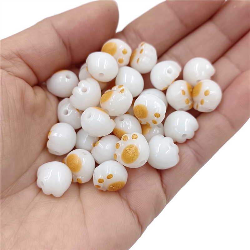 10 ชิ้น สร้างสรรค์ เลียนแบบ สีขาว หยก ถ่าน เผาไหม้ สามมิติ อุ้งเท้าแมว หลวม ลูกปัด แฟชั่น สร้อยข้อมือ ต่างหู วัสดุทําด้วยมือ - รูปที่ 6