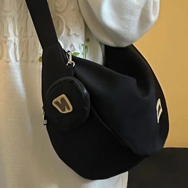 IELGY dumpling bag ญี่ปุ่นไนลอน messenger casual ความจุขนาดใหญ่กระเป๋าเกี๊ยวผ้าใบสําหรับผู้หญิง