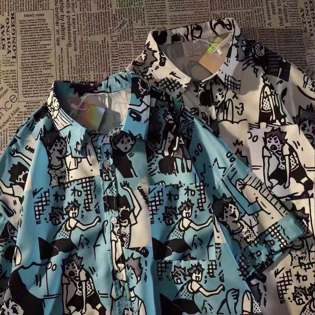 เสื้อเชิ้ตแขนสั้น พิมพ์ลายการ์ตูน ทรงหลวม สไตล์วินเทจ สําหรับผู้ชาย และผู้หญิง มี 2 สี