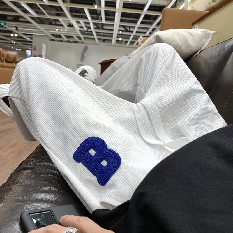 วาฟเฟิลกางเกงผู้ชาย ins กางเกงลําลองขากว้างตรง High Street หลวมกีฬา Sweatpants