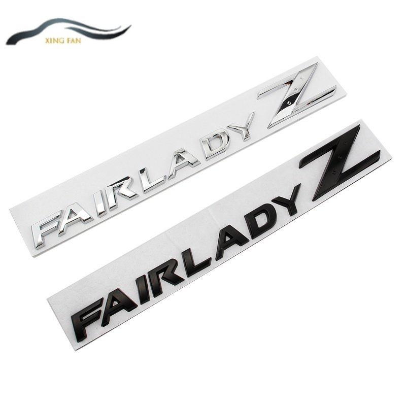 Xinfan สติกเกอร์โลโก้โลหะ ลายสัญลักษณ์ Fairlady Z Nissan 350Z Fairlady Z33 สําหรับติดตกแต่งตัวรถยนต์