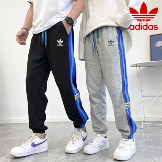 Adidas กางเกงวอร์มแฟชั่น 100% ทรงหลวม ลายทาง สีฟ้า สําหรับผู้ชาย ผู้หญิง ใส่เล่นกีฬา วิ่งจ๊อกกิ้ง