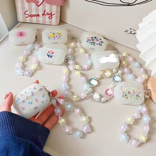 เคสหูฟังบลูทูธไร้สาย ซิลิโคนนิ่ม ลายดอกไม้ พร้อมจี้เรืองแสง สําหรับ AirPods Pro 2 3 AirPods 1